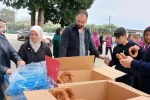 Kozan’da şehit aileleri ve gazilerden öğrencilere simit ikramı 