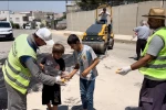 Kurtalan’da kavurucu sıcakta çalışan belediye ekiplerine çocuklardan soğuk su ikramı