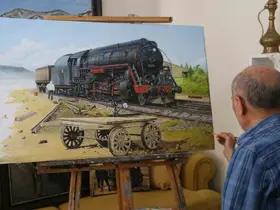 Demir yollarından emekli oldu, hiç bitmeyen tren sevgisini yaptığı tablolarda yaşatıyor
