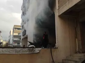 Hatay’da apartman dairesi ve metruk binada yangın
