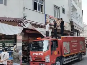 İş yerinde mahsur kalan kedi için itfaiye ekipleri seferber oldu
