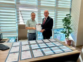 KESOB’un konut projesinde arsaların tapuları alındı
