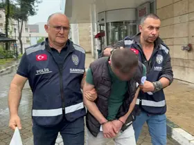 Mezarlıkta eşini darbeden koca tutuklandı

