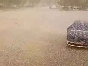 Şiddetli doluyu hem kaydetti hem dua etti
