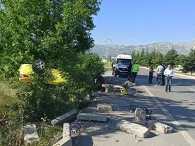 Takla atan otomobilden sürücü yaralı kurtuldu