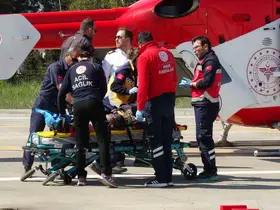 Tarlada bacağı kırılan kadın, ambulans helikopterle hastaneye ulaştırıldı
