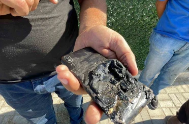Akülerin üzerinde unutulan cep telefonu patladı 