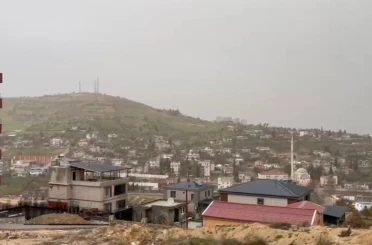 Besni’de toz taşınımı ve sağanak hayatı olumsuz etkiledi 