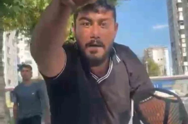 Cam silme bahanesiyle aracın kaputuna yatıp zorla para istemişti, tutuklandı 