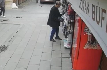 Dükkanın önündeki fanlı ısıtıcıyı bakıyormuş gibi yapıp alıp gitti