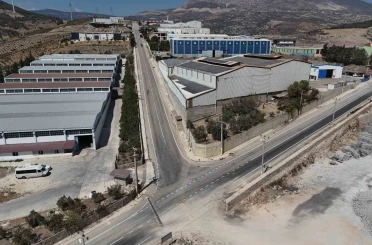 Hatay Büyükşehir Belediyesi, Antakya OSB’de yolları asfaltladı 