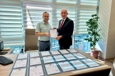 KESOB’un konut projesinde arsaların tapuları alındı 