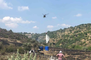 Makilik alanda başlayan yangın büyümeden söndürüldü 
