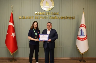 Rektör Özölçer Dünya Şampiyonu Basancı’yı kabul etti 