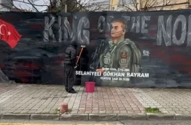 Şehidin resmini grafiti yapan gence Başkan Doğan’dan hediye 