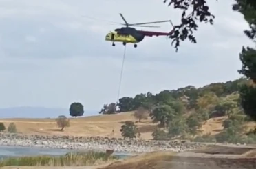 Tavşanlı’da yıldırım düşmesi sonucu çıkan orman yangını havadan müdahaleyle kısa sürede söndürüldü 