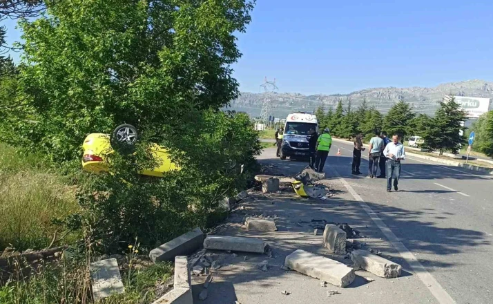 Takla atan otomobilden sürücü yaralı kurtuldu