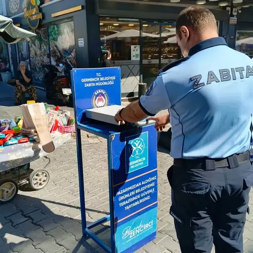 Germencik’te semt pazarında etiket ve tartı denetimi
