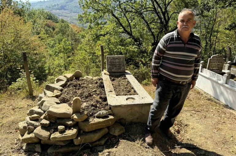 Mezarı kazıp tahtaları kıran ayı cenazeye ulaşamadan kaçtı 