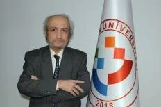 Üniversitenin lojmanında ölü bulundu 